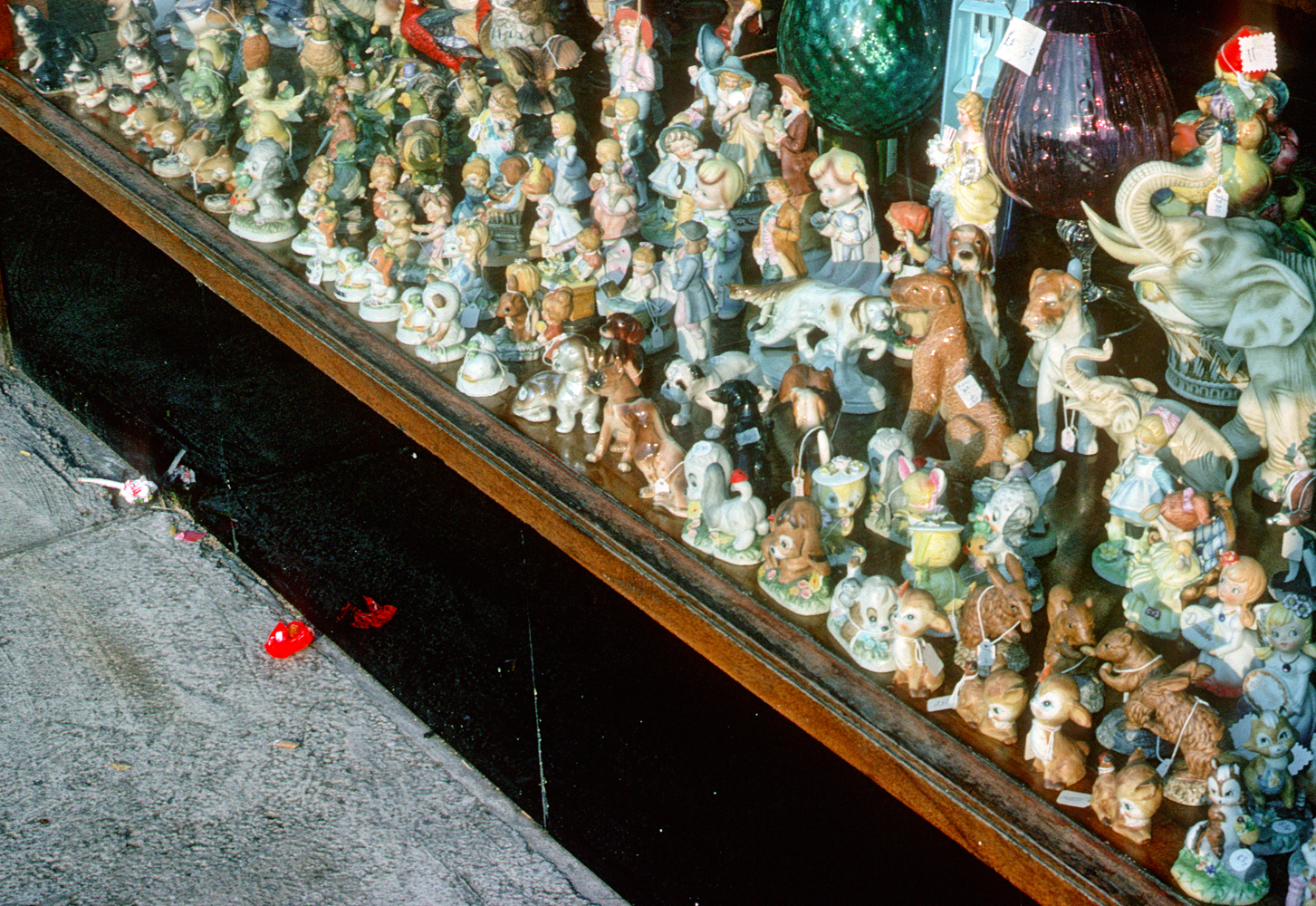 Large collection of miniatures displayed in shop window