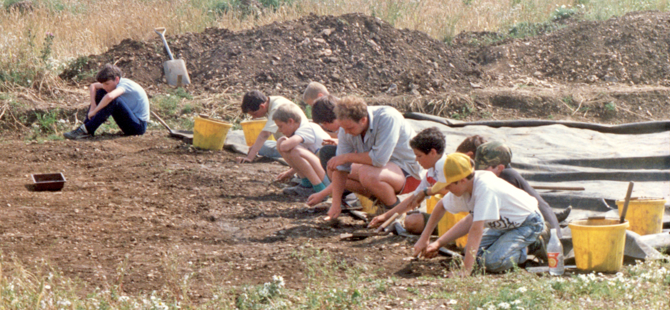 primary school children excavating